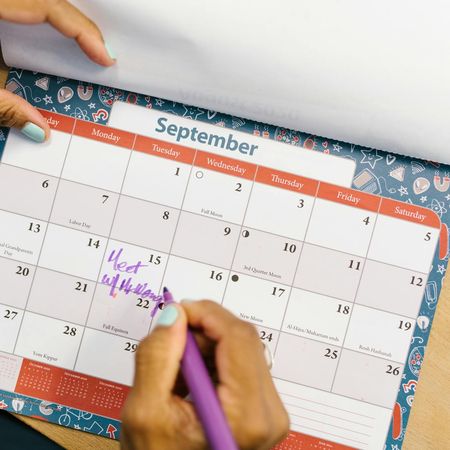 Calendar with marked days, symbolizing building a consistent habit.